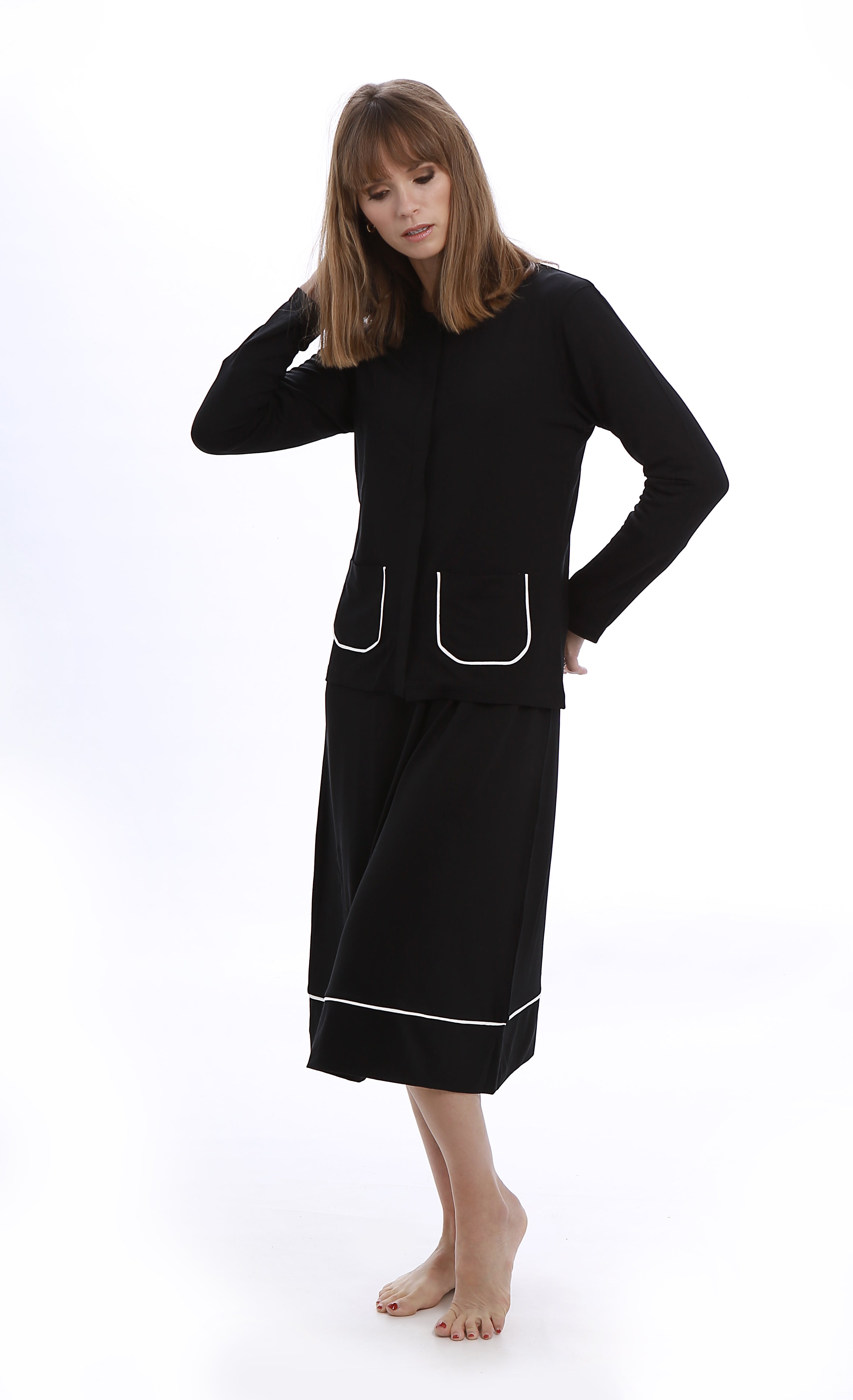 Eminently comfortable and effortlessly chic, this is the perfect little black (night)dress.    Features:  Nightdress:  Knee length 3/4 sleeves Embroidered detail Round neck Cardigan:  Button down closure Patch pockets