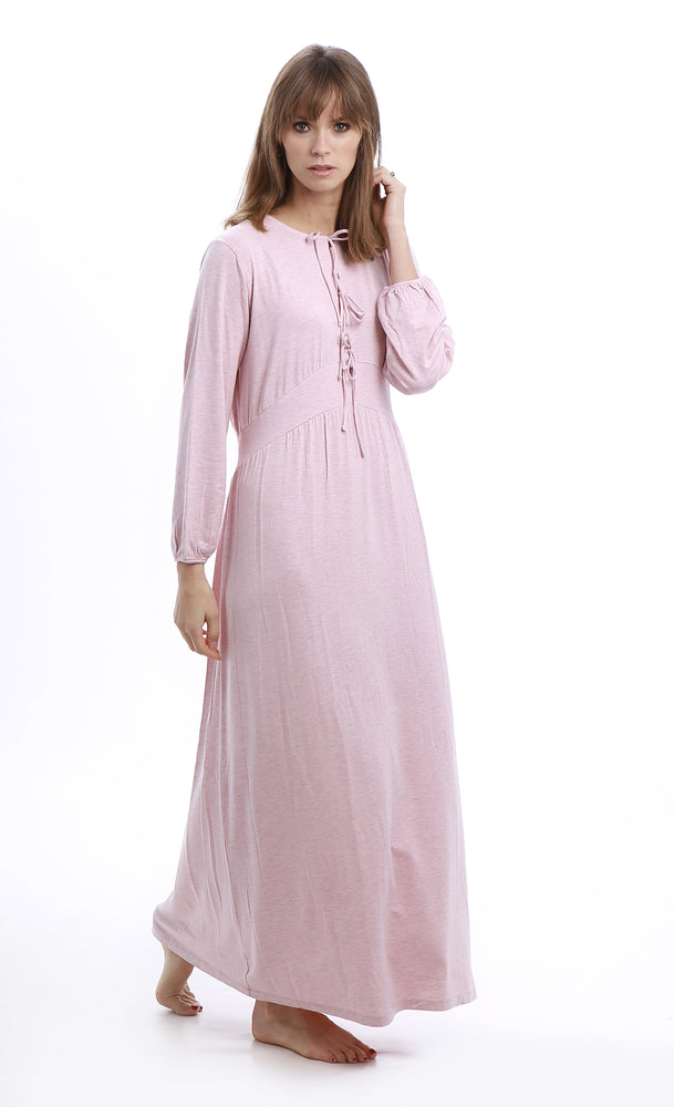 Lotte powder pink melange- Rojo London. This maxi length nightgown features an empire waist and delicate bow closures for an impeccably elegant and feminine design. Available in two soft melange hues.
